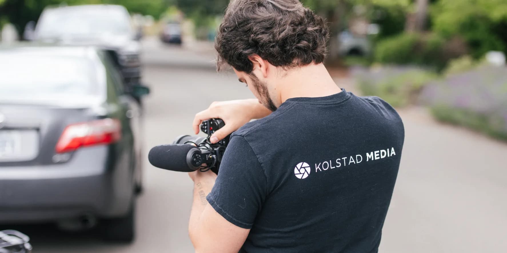 A Kolstad Media filmmaker shooting on location in the community